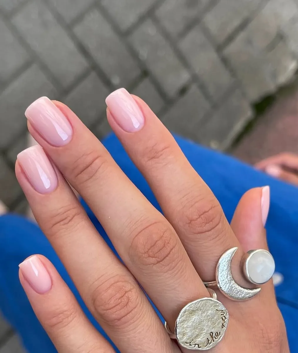 A milky pink gel manicure