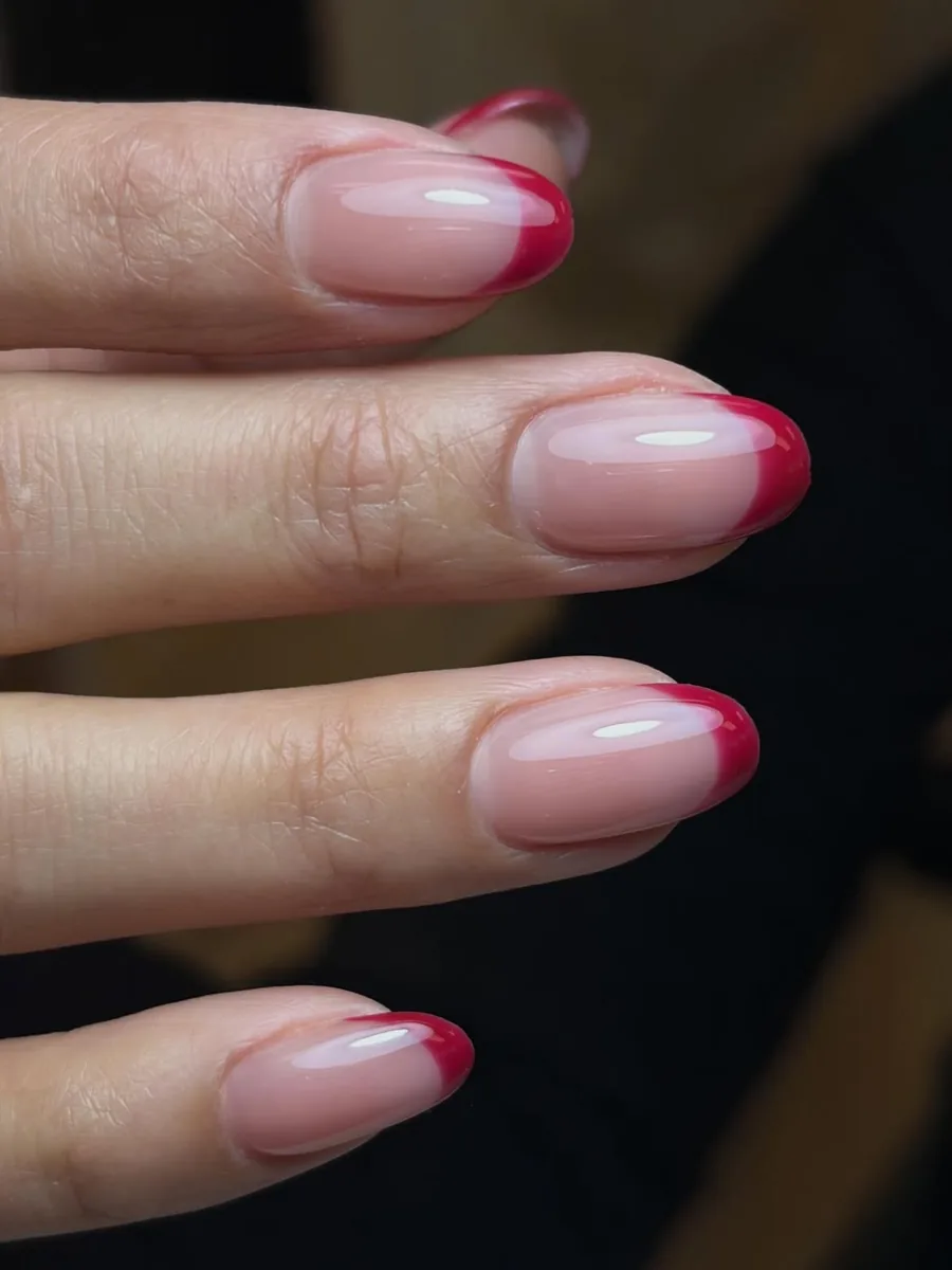 Deep red French tips, close up